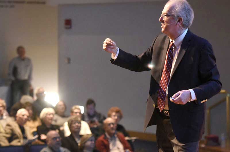 one day university lecturer speaking in front of audience